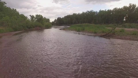 Low Spin Over River Stock Footage 98847161