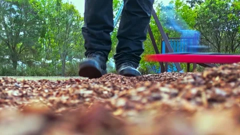 Low static shot of metal detector swinging Infront of camera Stock Footage 264004906