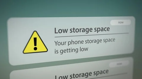 Low Storage Space Notification on Smart Phone Stock Footage 124475599
