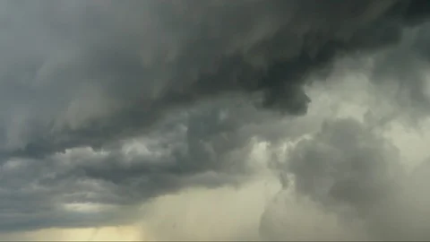 Low stormy clouds in the blue sky. Timelaps Stock Footage 113632848