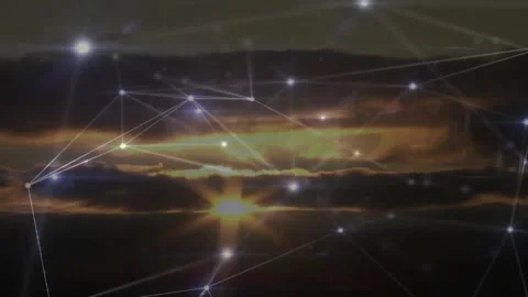 Low sun peeking through clouds initiating glowing network pulsing nodes Stock Footage 312003962