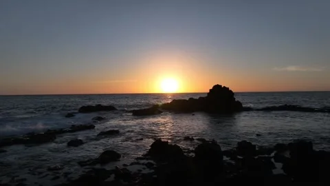 Low Sunset Over Ocean with Rock Silhouettes – Gran Canaria Stock Footage 309945752
