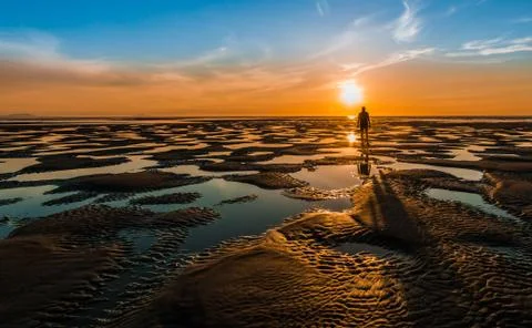 Low Tide Bach Sunset Stock Photos
