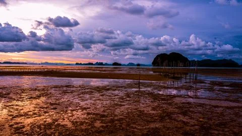 Low tide at the beach  during sunset , Thailand Stock Photos
