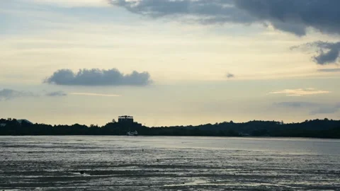 Low tide during sunset on the beach in Phuket, Andaman Sea, timelapse. Stock Footage 138956751