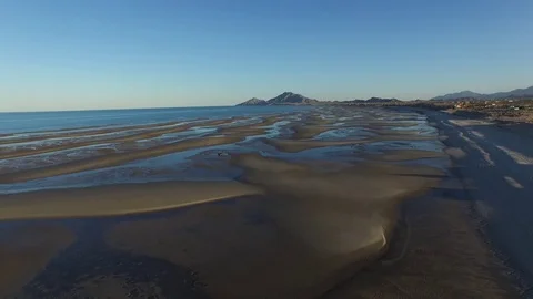 Low tide at an empty beach in Mexico - Aerial 動画素材 75966434