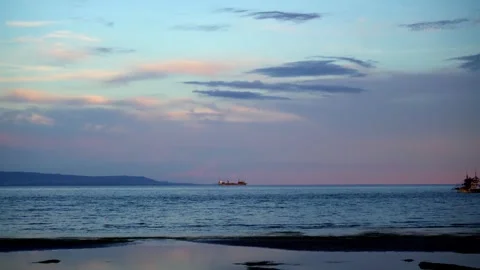 At low tide, people collect algae and mollusks and arthropods, crabs run to the Stock Footage 272507572