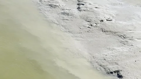 Low tide water flow at mudflats Stock Footage 315726788