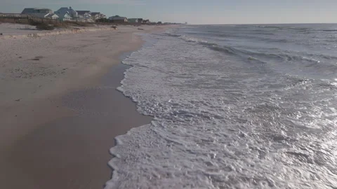 Low Tide Waves Crashing on a Beach Drone Video Stock Footage 261475318