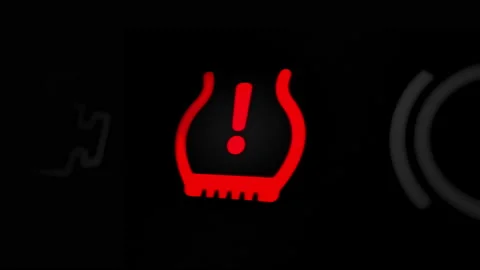 Low Tire Pressure Warning Light on Car Dashboard Stock-Footage 236939830