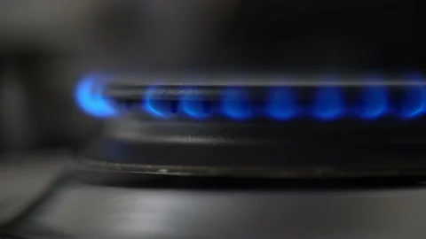 Low view of blue Gas flames. Small flames turning into larger flames Video stock 173437106