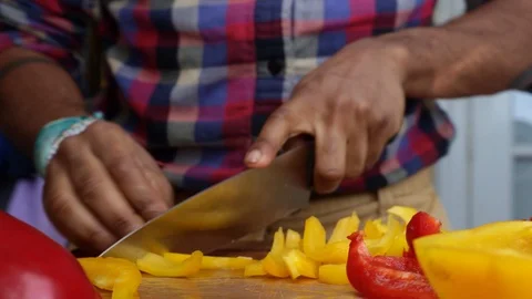 Low view chef preparing vegetables and dancing at home - 25 sec Stock Footage 127868834