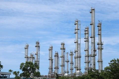 Low view of chimneys tower for burning waste generated from Stock Photos