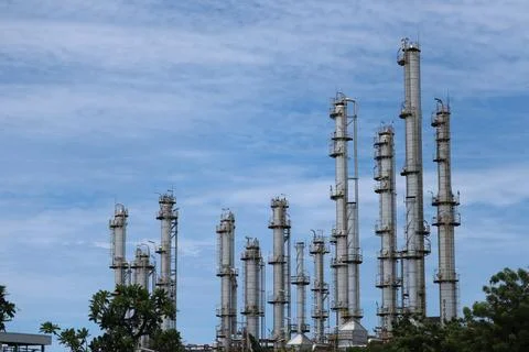 Low view of chimneys tower for burning waste generated from Stock Photos