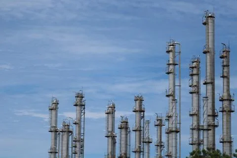 Low view of chimneys tower for burning waste generated from Stock Photos