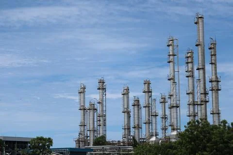Low view of chimneys tower for burning waste generated from Stock Photos