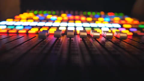 Low view of dj remote or soundboard with moving buttons and brightly glow keys Stock Footage 322163319