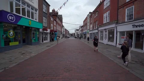 Low view down Chichester high street in Sussex, England Vidéo 250011371