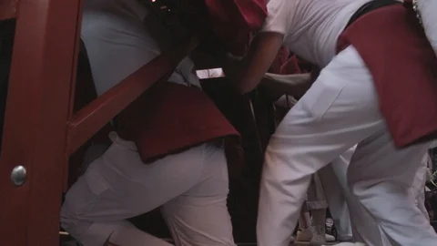 Low view of float bearers going inside a holy week pass with a change of Video stock 105670049