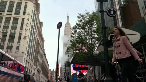 Low view Macys Empire State Building Harold Square Manhattan New York City NYC Video stock 107343429
