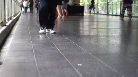 Low View of peoples walking, Shallow Depth Of Field. Stock Footage 69077744