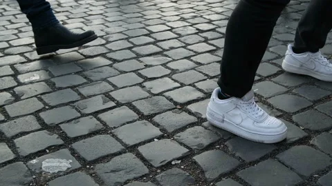 Low view of Rome Paving Cobblestone street with tourists people foot walk,urban Stock Footage 222642573