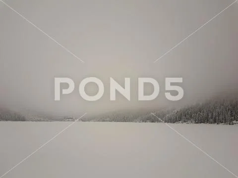 Low visibility conditions due to a fog in Tatry in Poland at winter time Stock Photos