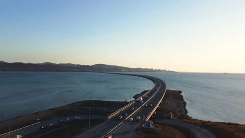 For a low-water bridge over which cars travel in both directions Stock Footage 163979219