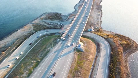 For a low-water bridge over which cars travel in both directions Stock Footage 163979794