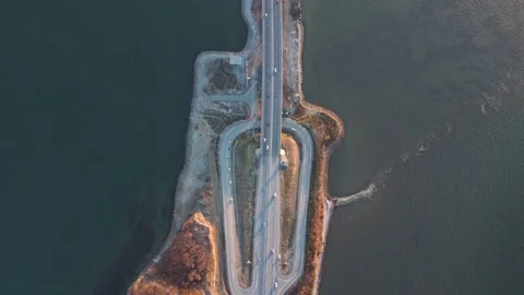 For a low-water bridge over which cars travel in both directions Stock Footage 163985410