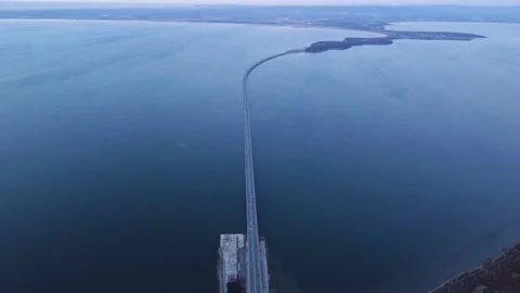 For a low-water bridge over which cars travel in both directions Stock Footage 163987407