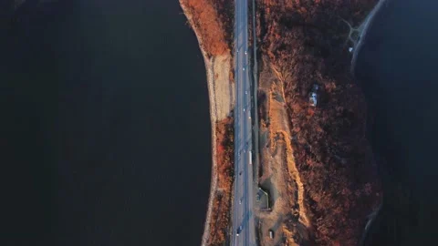 For a low-water bridge over which cars travel in both directions Stock Footage 163988929