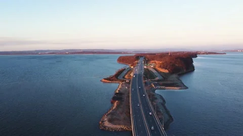 For a low-water bridge over which cars travel in both directions Stock Footage 163991372