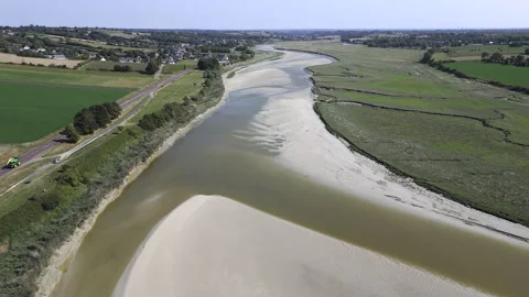 Low water level in river in French countryside. Drone footage. Stock Footage 220683404