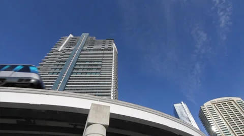 Low Wide Angle of a Electric Train passes in front of buildings downtown Miami. Stock Footage 36640564