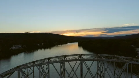 Lower Altitude behind bridge Sunset Stock Footage 91897613