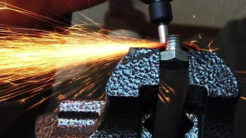 Lower Angle Cutting A Metal Bolt With Dremel Tool Stock Footage 219129267