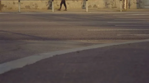 Lower Angle, Pedestrians Going to Work on the Background of the Road on Which Stock Footage 159315956