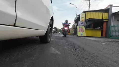 A lower-angle shot of a highway in Blora District, Central Java, Indonesia Video stock 334225900