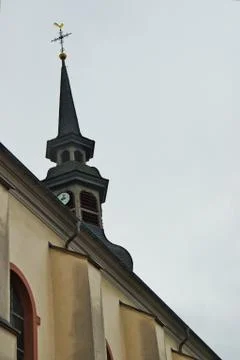 Lower angle view of an classic cloister's clock tower Foto stock