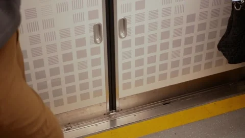 Lower angle view to door of train commuter subway while door closing from i.. Stock Footage 289813425