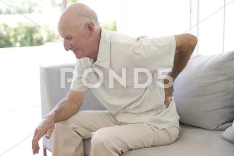 Lower back pain Stock Photos