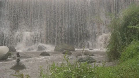 The lower boundary of the waterfall which creates fog Stock Footage 234947959