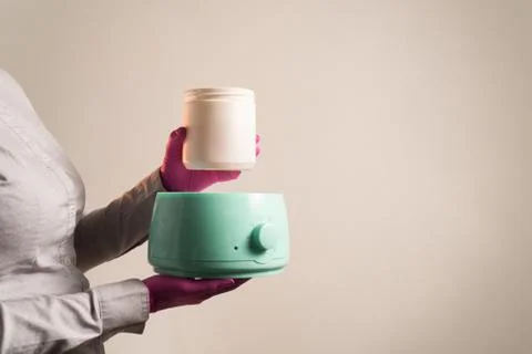 Lower the can to heat the paste Stock Photos