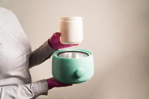 Lower the can to heat the paste Stock Photos