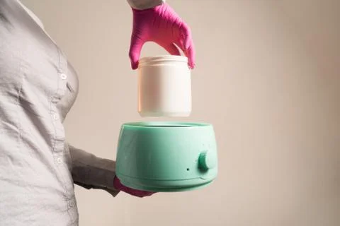 Lower the can to heat the paste Stock Photos