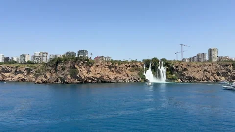 Lower Duden Falls drop off a rocky cliff falling from about 40 m Stock Footage 297961692