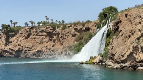 Lower Duden Falls drop off a rocky cliff falling Stock Footage 297962089