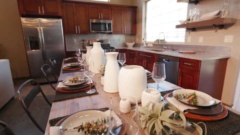 Lower to End of Large Dining Room Table in Kitchen Stock Footage 77168371