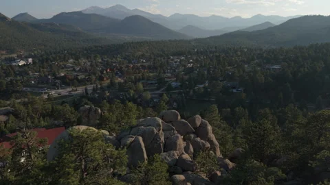 Lower flying over boulders towards Estes Park Colorado Stock Footage 341238535